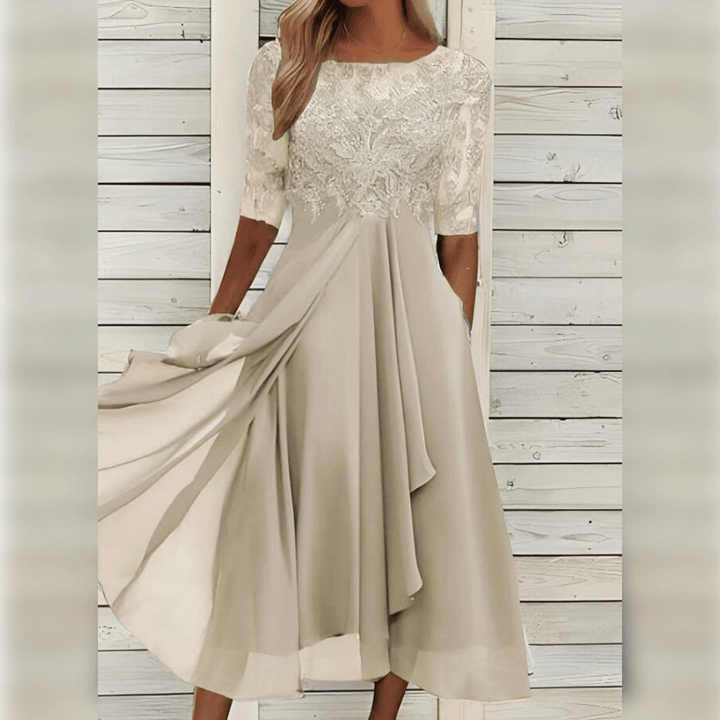 Dames elegante kanten jurk, ideale zomerjurk en feestjurk. Comfortabele en veelzijdige dameskleding.