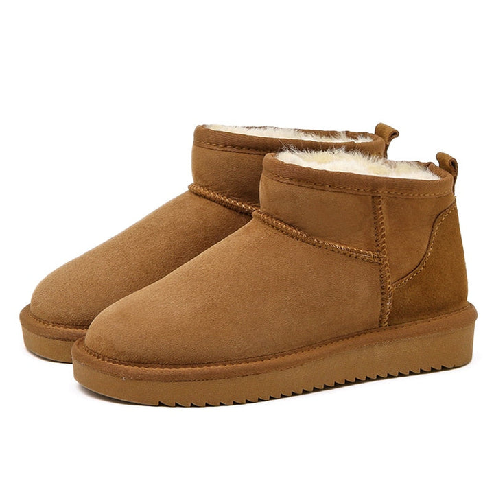 Detail van beige dames winterlaars; toont hoogwaardig materiaal, comfort en stijl voor winterweer.