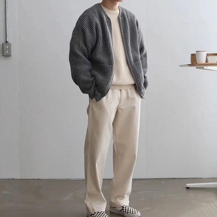 Praktisch heren vest met handige zijzakken; combineert mode, comfort en functionaliteit.
