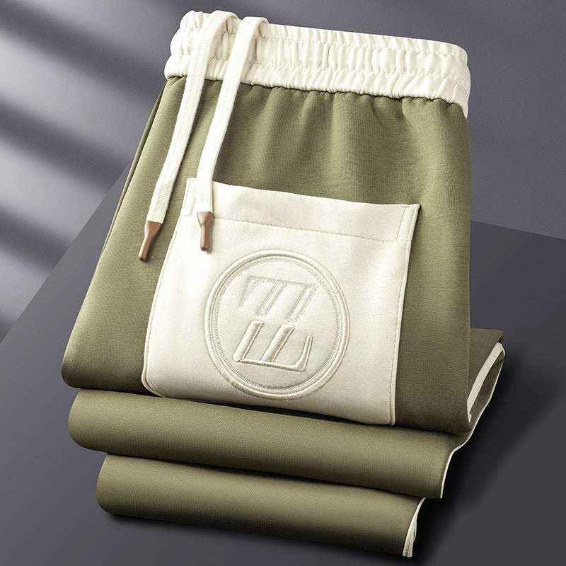Sportief heren joggingpak, polyester met lycra, voor een moderne en comfortabele uitstraling.