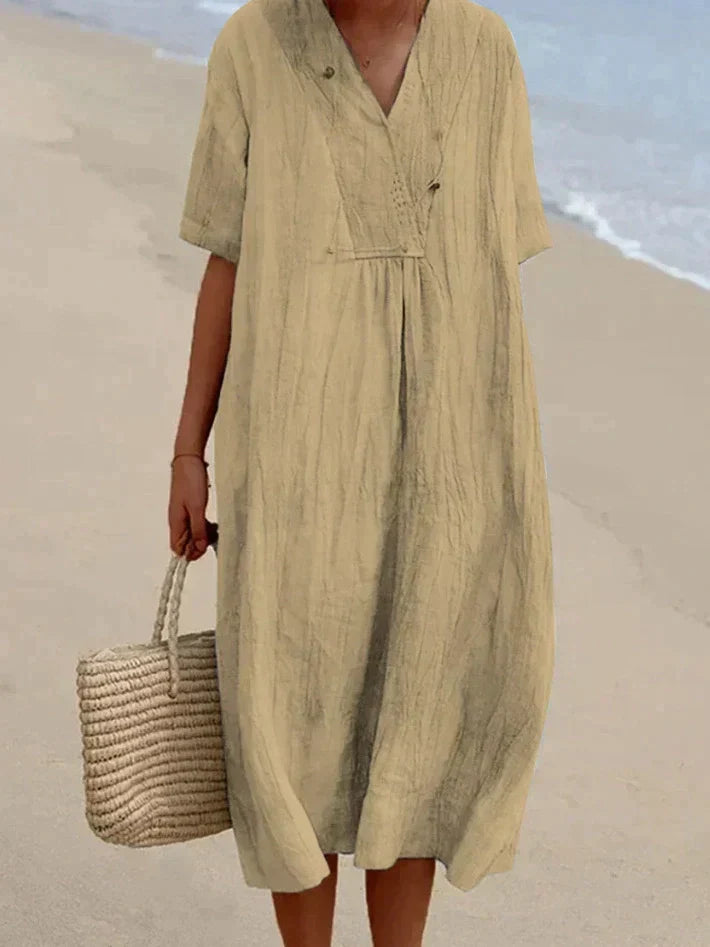 Luchtige katoen linnen midi-jurk Aria, de perfecte casual damesjurk met zakken voor de zomer.