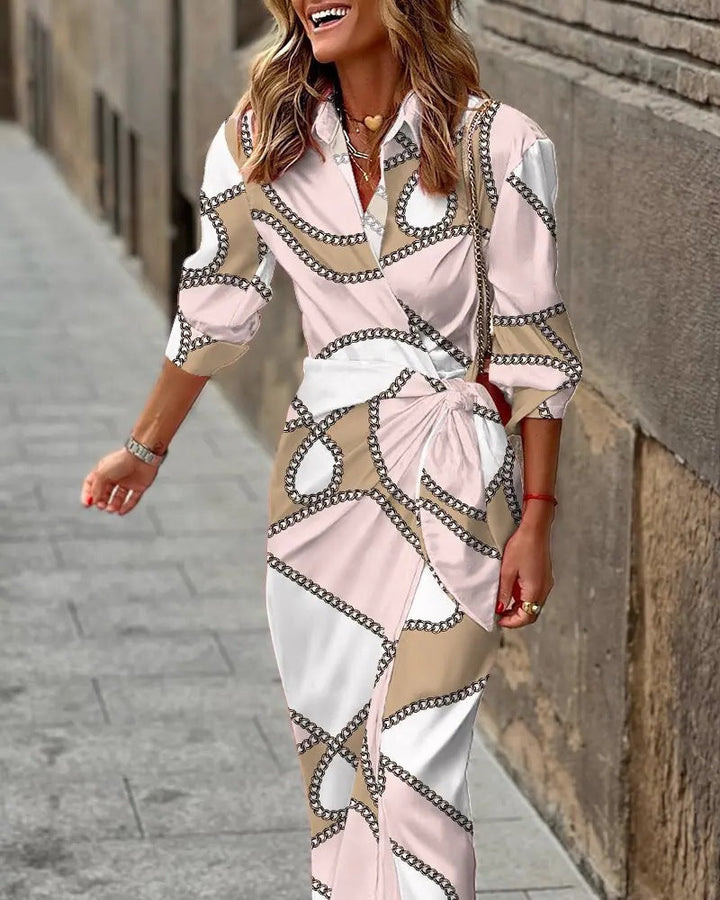 Zomerse dames wikkeljurk met kraag detail, gemaakt van lichtgewicht rayon.