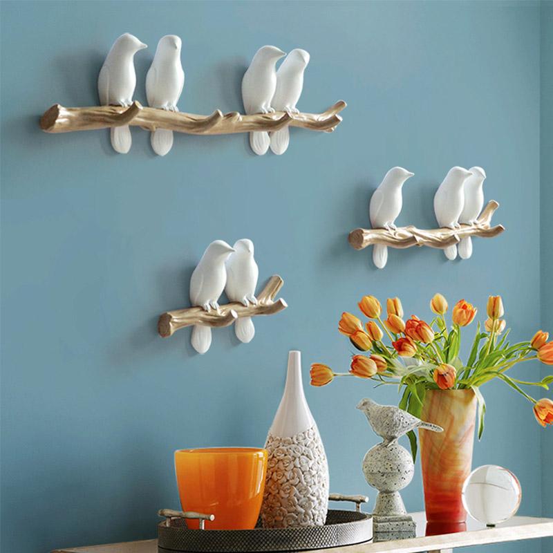Vrolijke wandkapstok van hars. Kleurrijke vogels als haken. Geschikt voor hal, kinderkamer, slaapkamer.