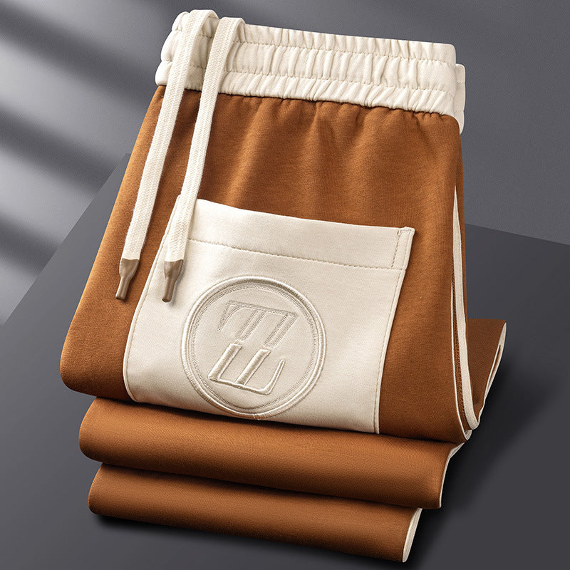 Ultiem comfortabel heren sportpak, polyester/lycra, perfect voor ontspanning en actieve momenten.