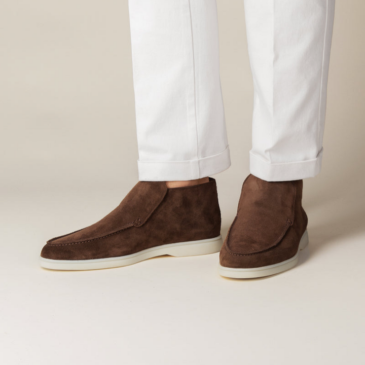 Klassieke penny loafers voor heren, zwarte lederen schoenen die elegantie combineren met comfort.