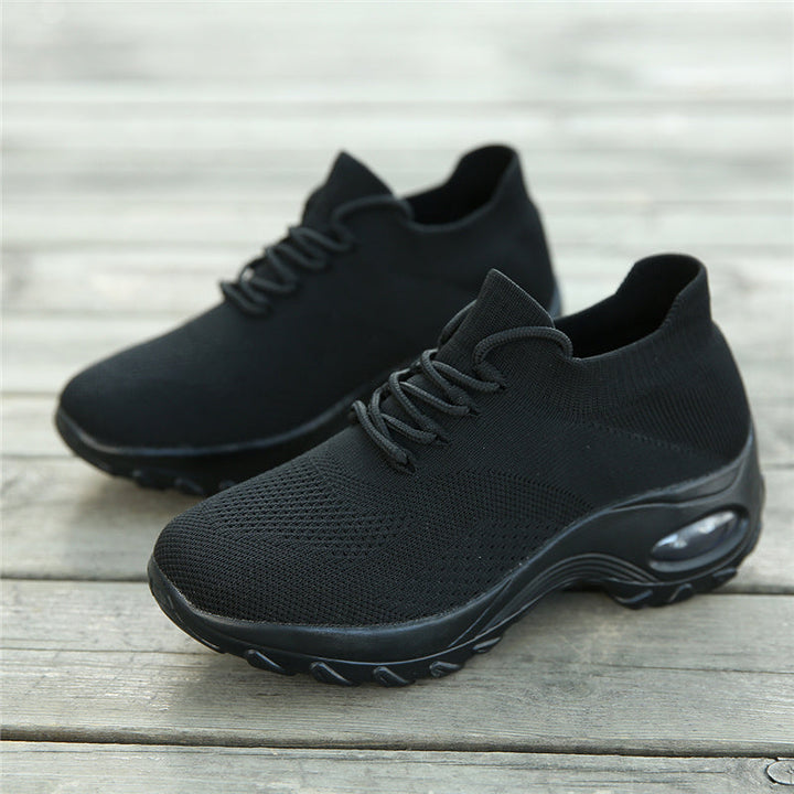 Zwarte dames pijnverlichtende sneakers; optimaal comfort & ergonomische voetondersteuning.