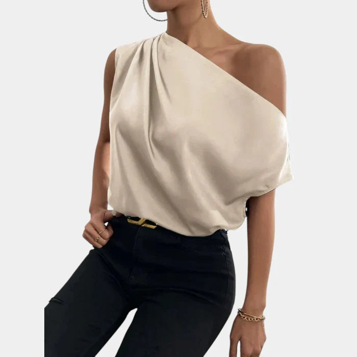 Losvallende off-shoulder dames top met vleermuismouwen in beige, ideaal als comfortabele en elegante zomertop.