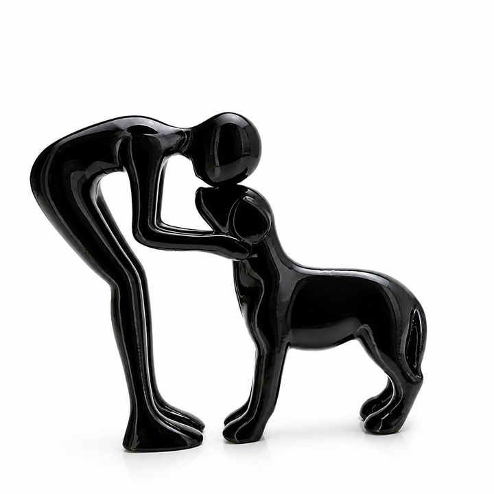 Abstract beeldje mens en huisdier, symboliseert liefdevolle verbinding. Stijlvolle woondecoratie voor elk interieur.