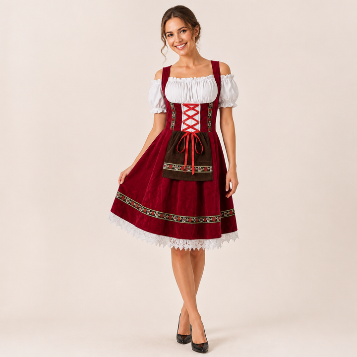 Stijlvolle Oktoberfest dames dirndl jurk in levendige kleuren met traditionele patronen en contrasterend schort.