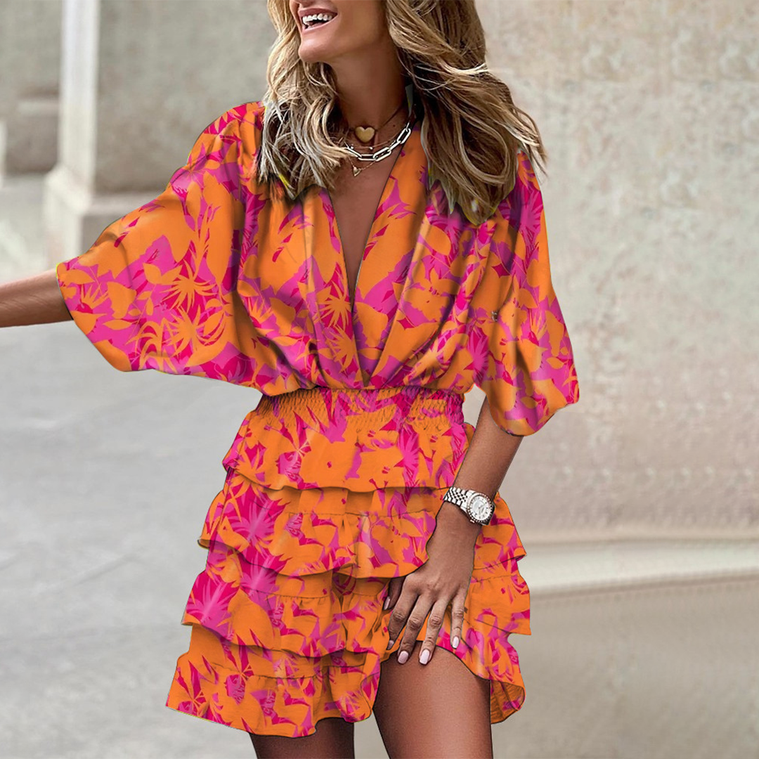 Elegante Hoymans dames minijurk, V-hals, met unieke geometrische print. Ideaal als feest- of strandjurk.