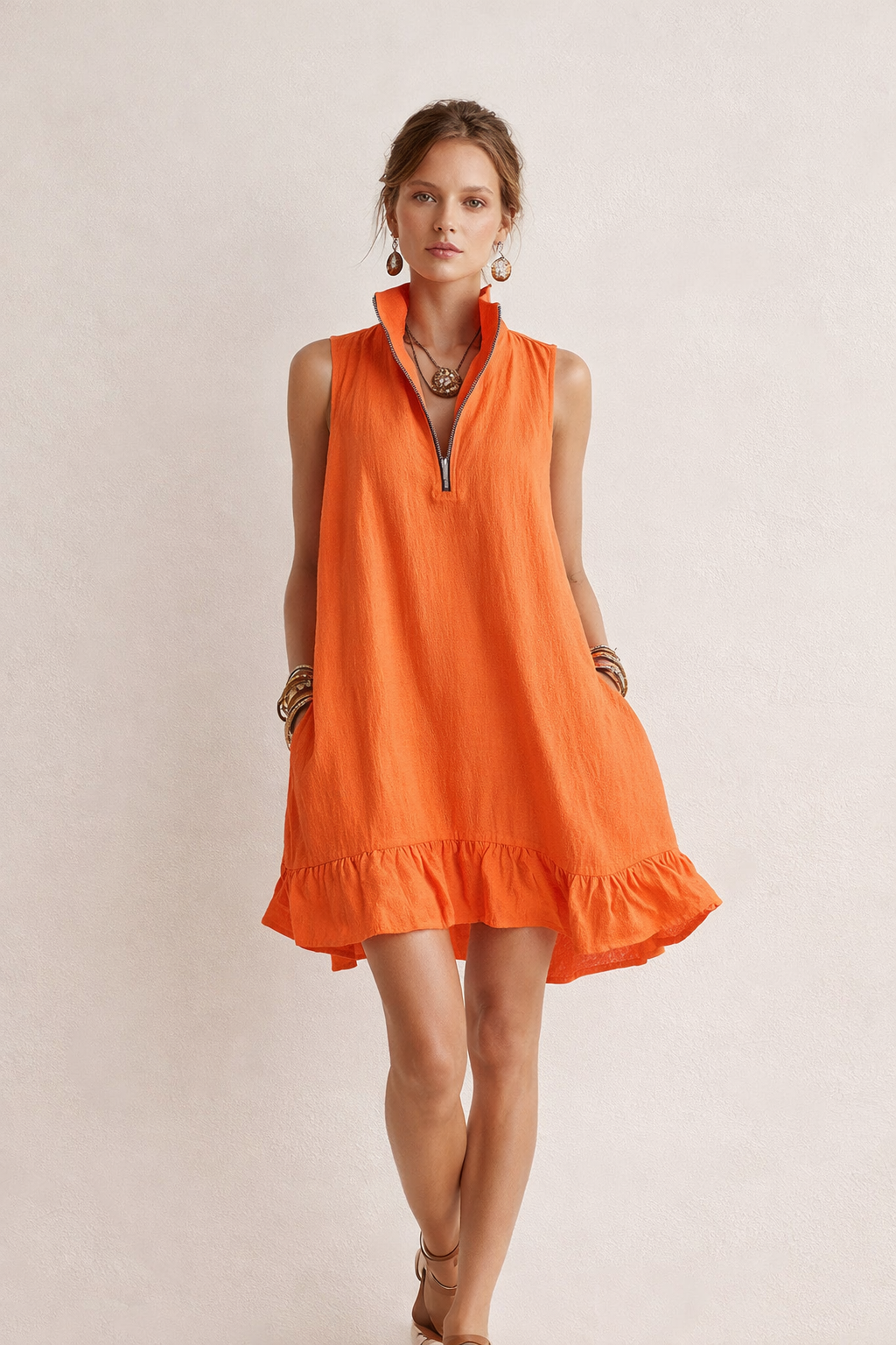 Dames zomerjurk mouwloos met ritssluiting, verkrijgbaar in roze, geel en oranje. Perfect voor casual vakantie.