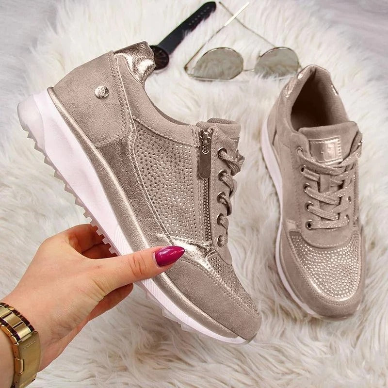 Grijze lichtgewicht dames sneakers, orthopedisch ontworpen voor maximaal comfort en ondersteuning.