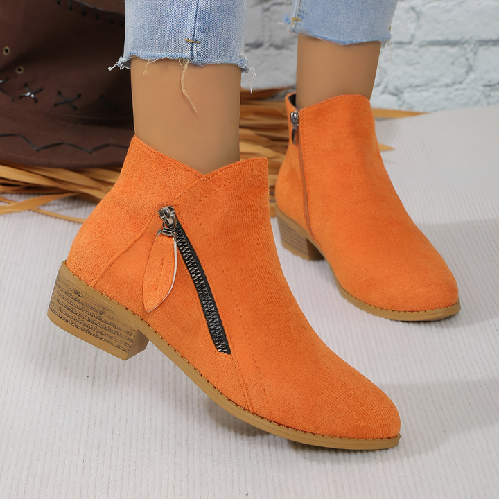 Dames orthopedische enkelhoge boots in zwart, comfortabel met ritssluiting voor dagelijks gebruik en ondersteuning.