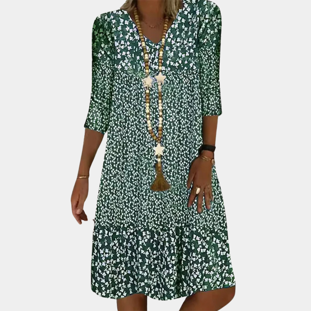 Comfortabele zomerse midi jurk voor dames met V-hals, ideaal voor casual of feestelijke gelegenheden.