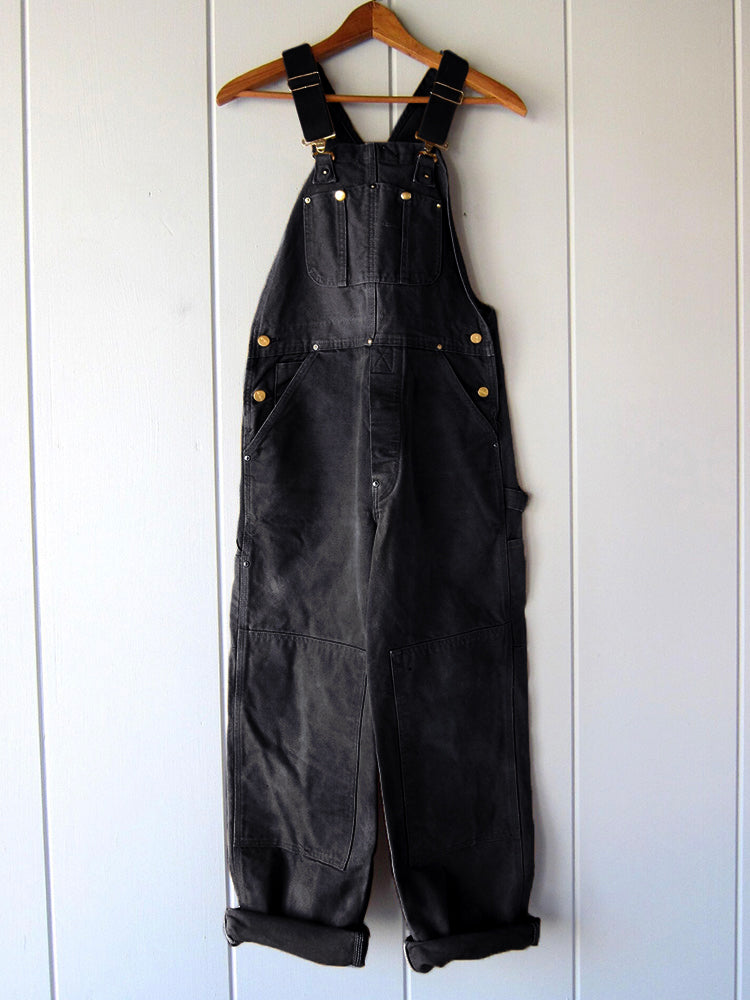 Elegante zwarte dames jumpsuit, verstelbaar en veelzijdig. Geschikt voor casual en workwear.
