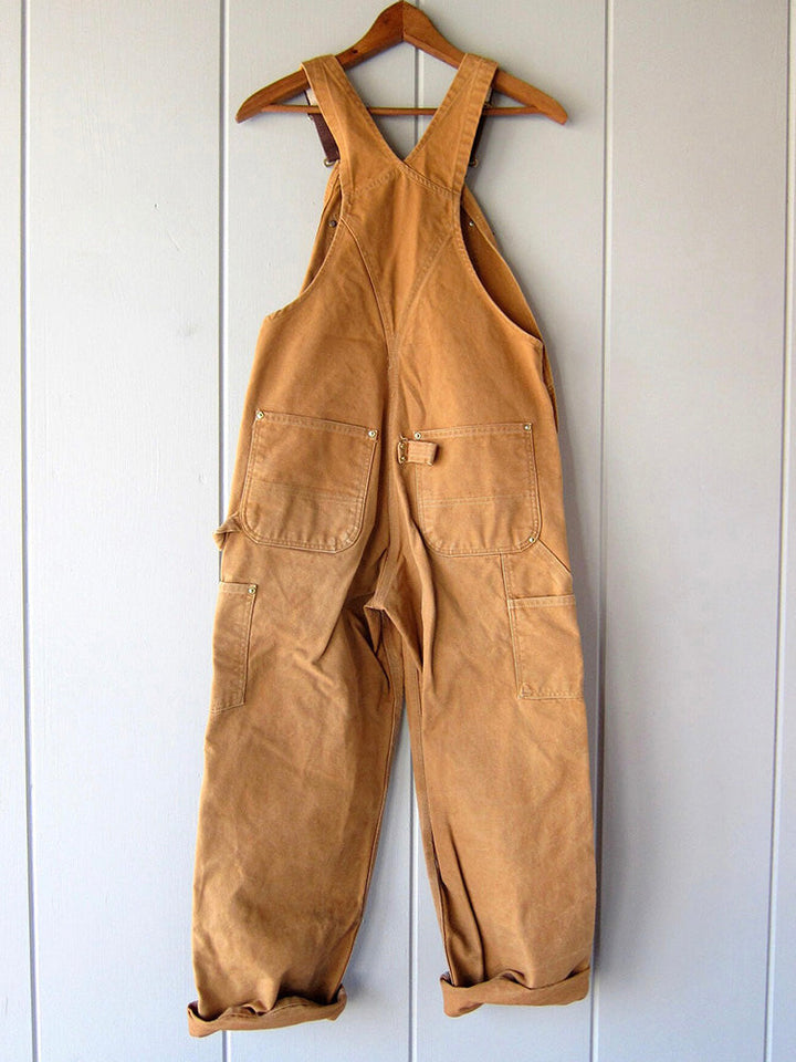 Stijlvolle bruine dames overall, perfect voor herfst. Comfortabel en modieus voor elke gelegenheid.
