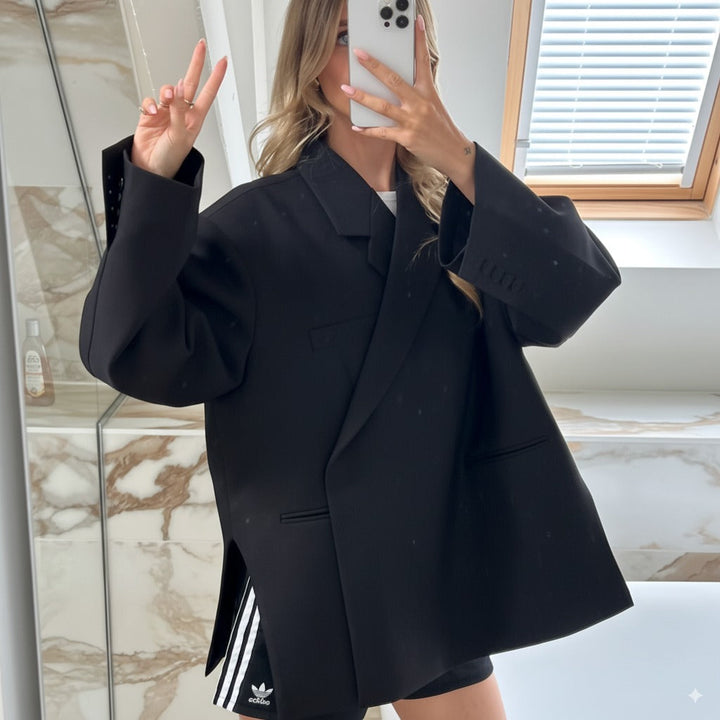 Veelzijdige grijze oversized blazer voor dames, geschikt voor elke gelegenheid; van kantoor tot stad.