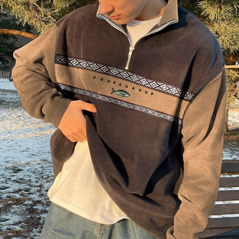 Comfortabele heren polyester fleece trui, oversized met rits. Stijlvol geometrisch design voor koude dagen.