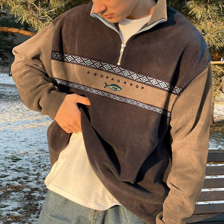 Comfortabele heren polyester fleece trui, oversized met rits. Stijlvol geometrisch design voor koude dagen.