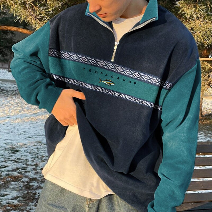 Casual heren trui: oversized fleece met rits en uniek geometrisch patroon. Ideaal voor herfst en winter stijl.