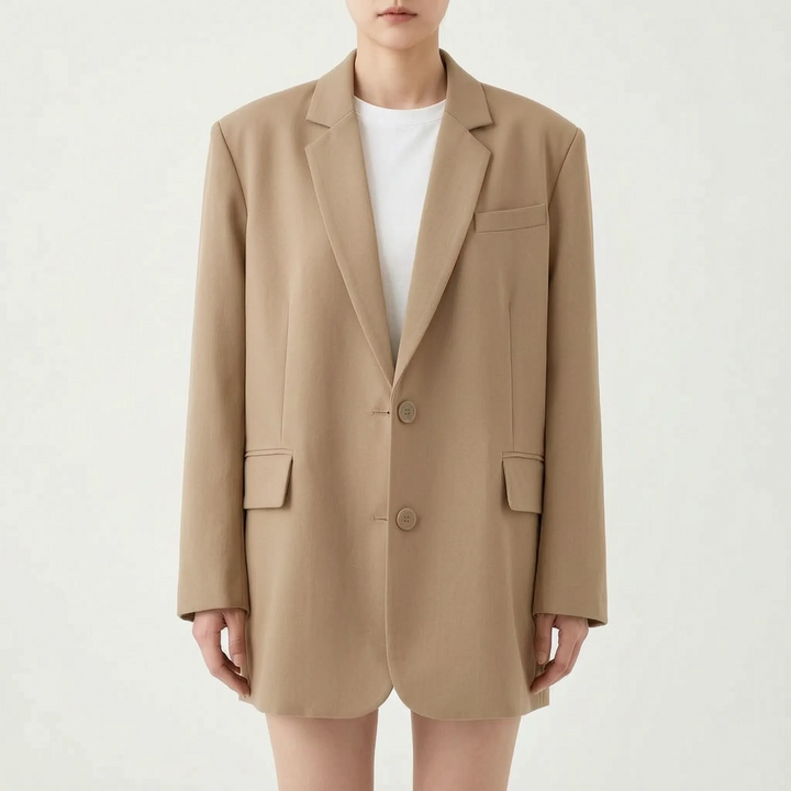 Dames oversized blazer, toont de ruime, relaxte pasvorm en veelzijdigheid van dit kledingstuk voor dames.