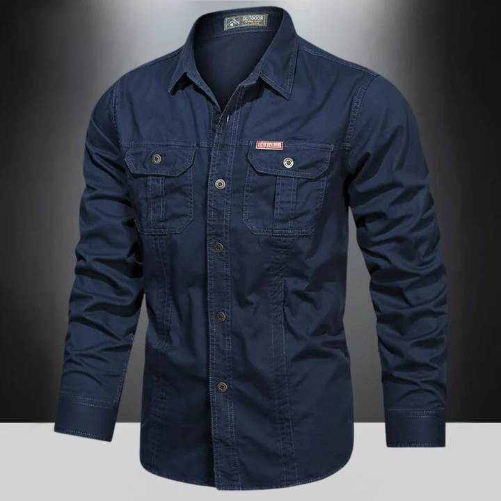 Comfortabel heren wandelshirt met lange mouwen. Voorzien van handige veiligheidszak, ideaal voor reiskleding.