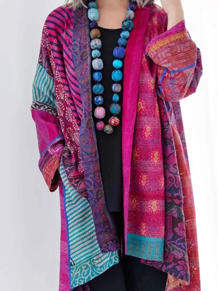 Elegant damesvest met verfijnd bloemmotief, comfortabel en stijlvol voor tijdloze damesmode.