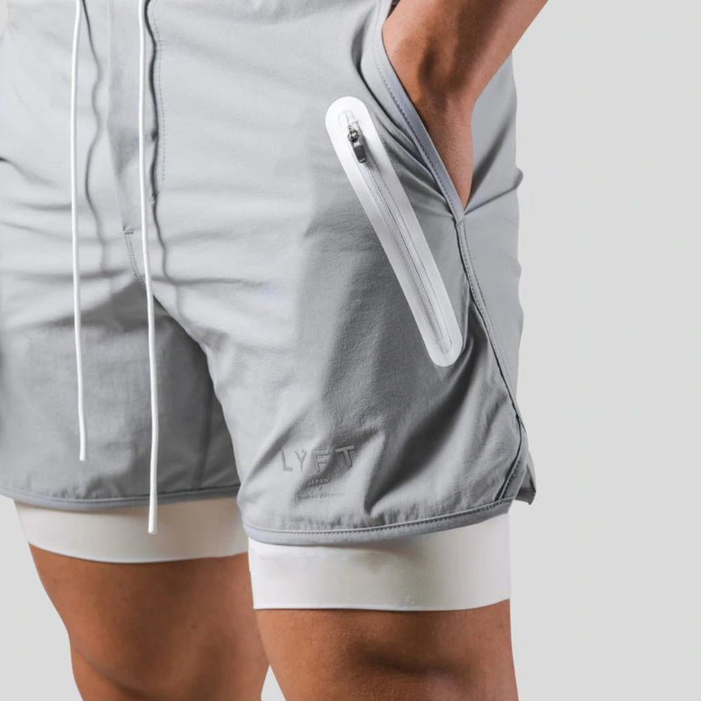 Stijlvolle heren activewear 2-in-1 sportshorts, perfect voor hardlopen, training en diverse sportactiviteiten.