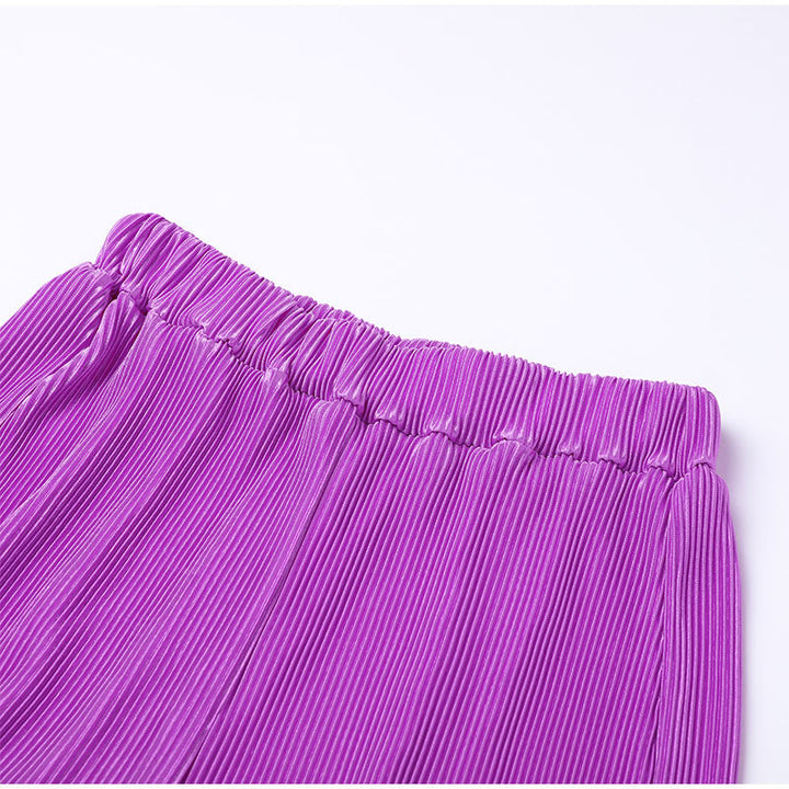 Close-up van de tailleband en zakken van de broek van de dames combi set. Praktisch.