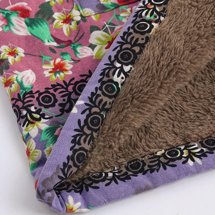Warme dames winterjas, model Seraphina, met lange pasvorm, zachte teddy voering en comfortabele capuchon.