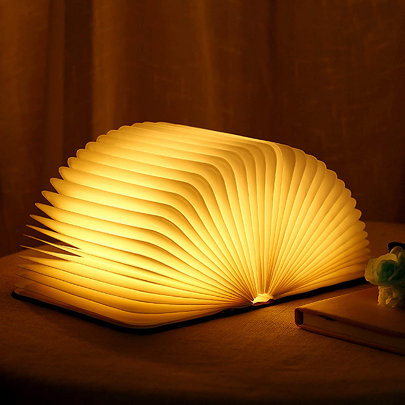 Draadloze boekenlamp met sfeervolle led-verlichting, ideaal als nachtlampje of interieur decoratie.
