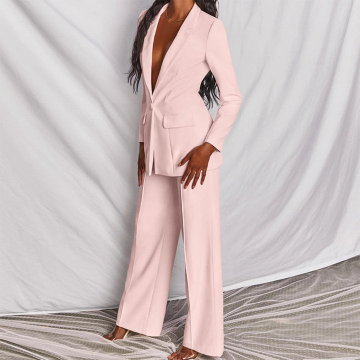 Comfortabel en stijlvol damespak, tweedelig. Modieuze blazer en pantalon, ideaal voor een elegante kantoorlook.