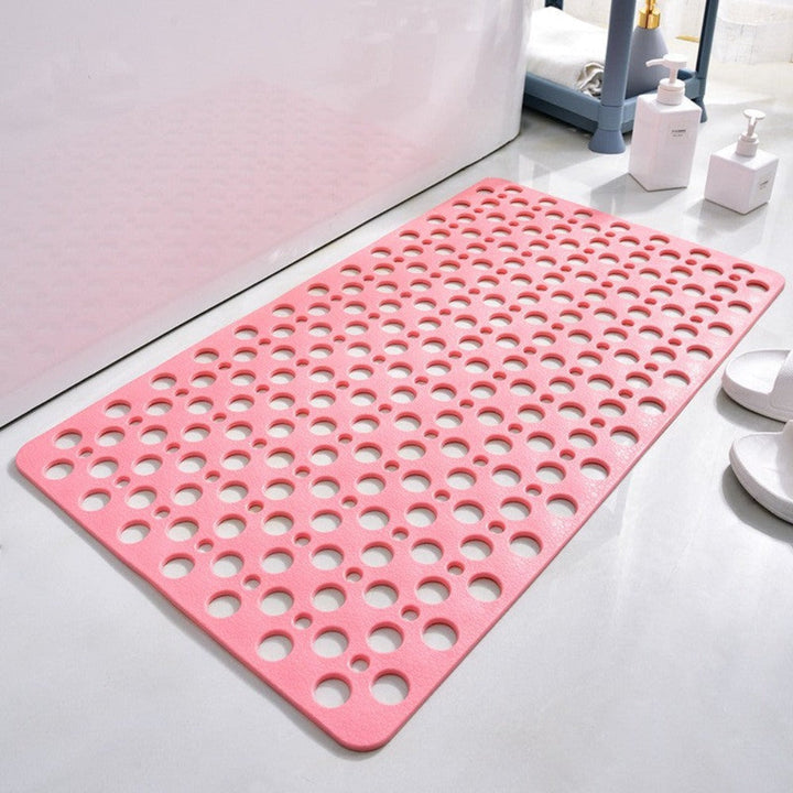 Hygiënische witte antislip douchemat met snelle afwatering en zuignappen, voor een veilige badkamer.