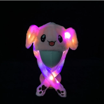 Lachend kind met grappige konijnenmuts, oren bewegen en LED lichtjes knipperen; fantastisch speelgoed of accessoire.
