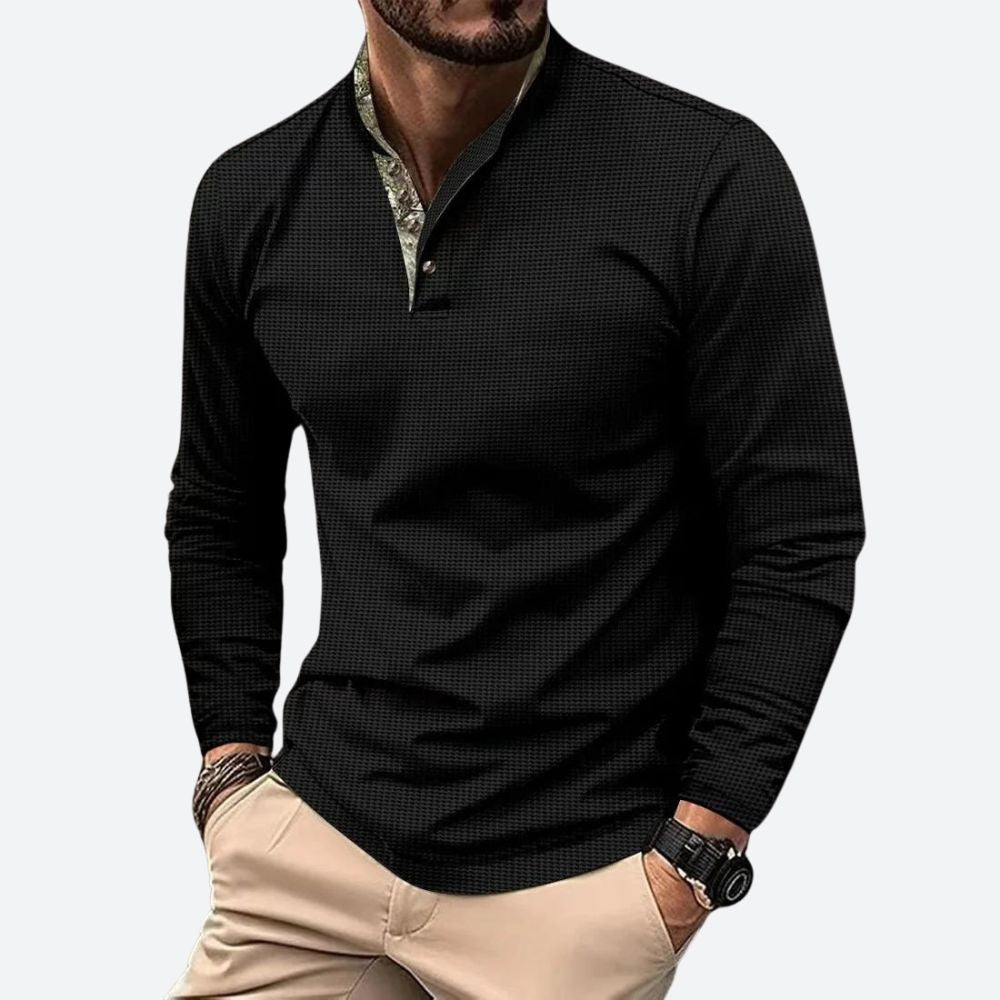 Comfortabel heren poloshirt met lange mouw, gemaakt van ademend materiaal. Ideaal voor veelzijdige casual kleding.