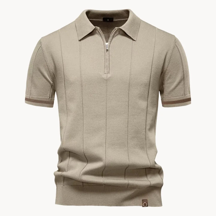 Heren polo met korte rits en klassieke kraag; hoogwaardig katoen voor optimaal draagcomfort.
