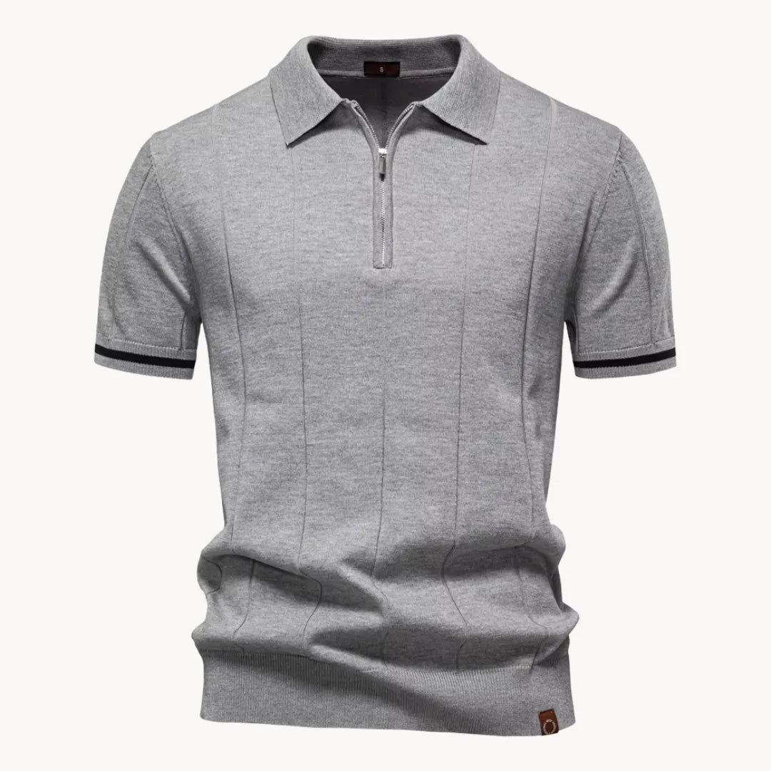 Details van heren polo: korte rits en klassieke kraag; hoogwaardige afwerking, comfortabel.