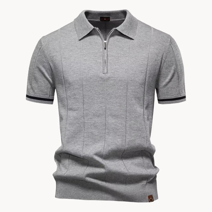 Details van heren polo: korte rits en klassieke kraag; hoogwaardige afwerking, comfortabel.