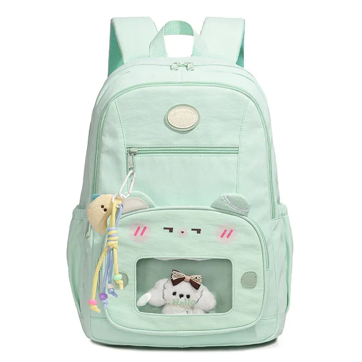 Stijlvolle preppy unisex rugzak van sterk nylon met transparant vak, een perfecte schooltas of college tas.