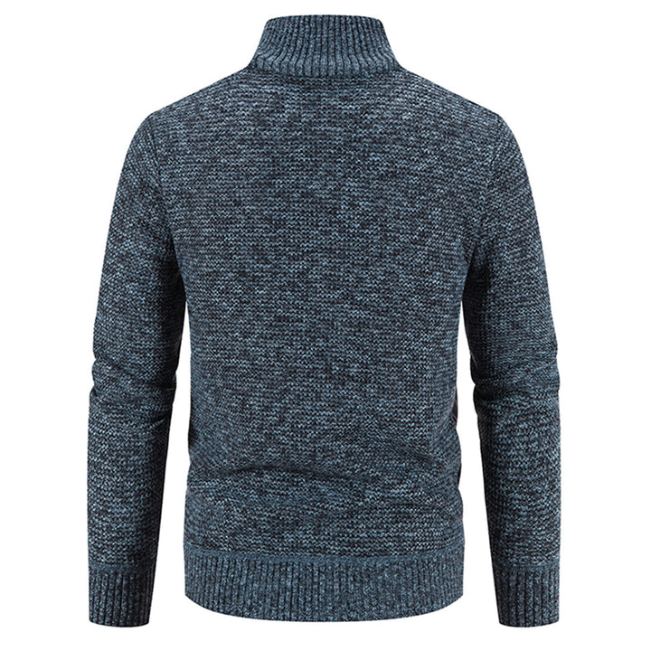 Opgevouwen heren trui vest met rits, toont de zachte textuur en nette afwerking.