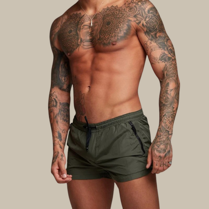 Zwarte heren stretch zwembroek, comfortabel en sneldrogend, ideaal voor zomerse dagen, zwemmen en strandvakanties.