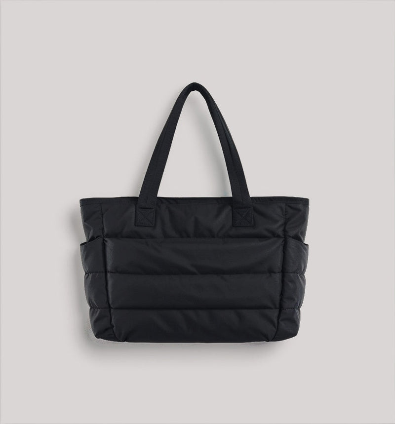 Unisex puffer schooltas met ruim laptopvak voor dagelijks gebruik. Praktische en modieuze studententas.