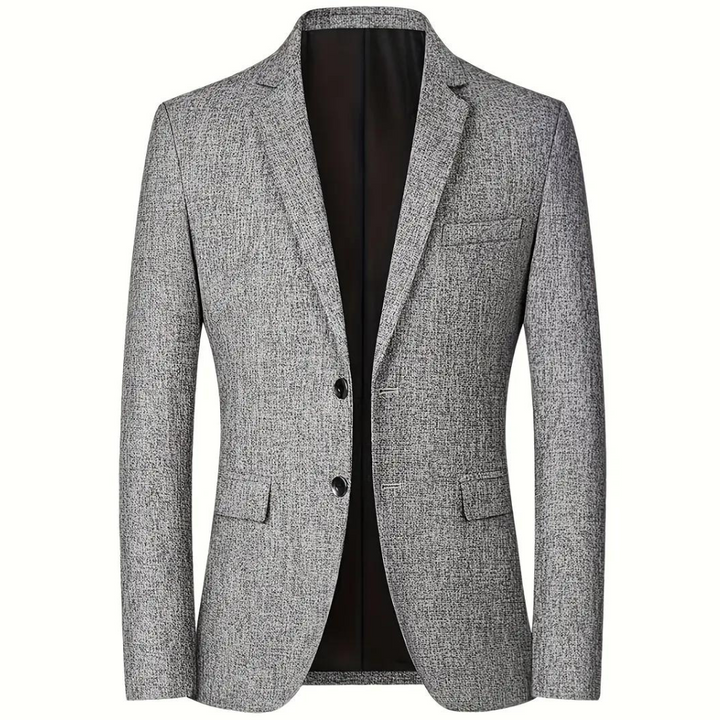 Elegant detail van de revers en knopen van deze stijlvolle heren blazer voor de moderne man.