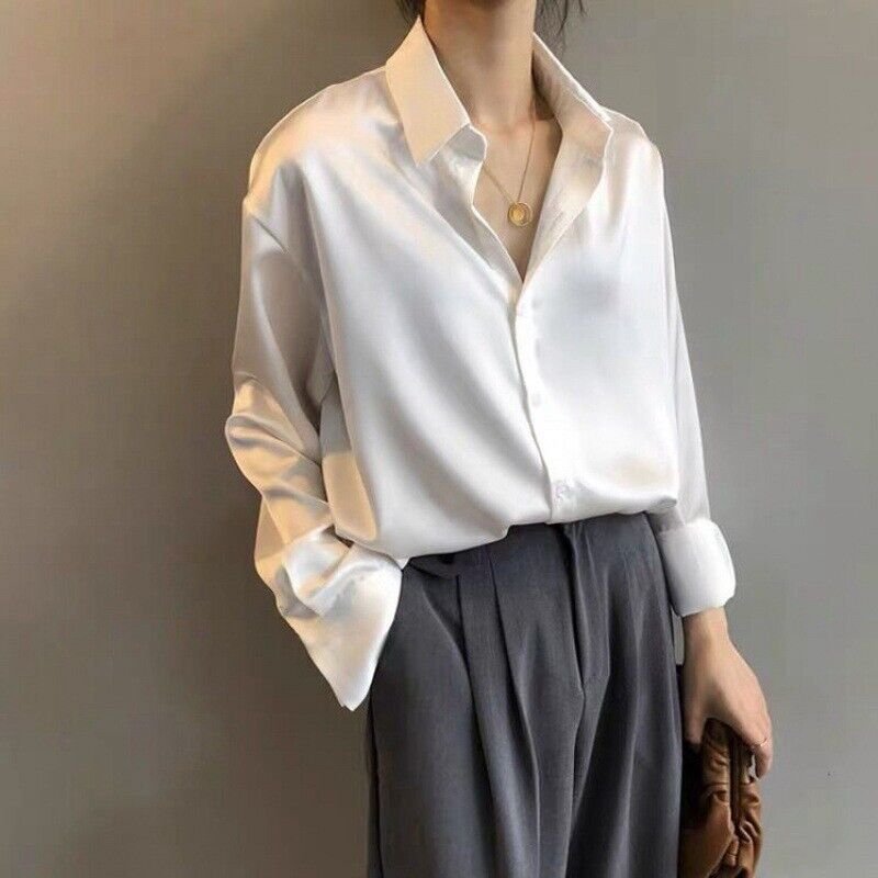 Veelzijdige damesblouse retro geïnspireerd. Elegante top met lange mouwen voor een dagelijkse, chique en comfortabele look.