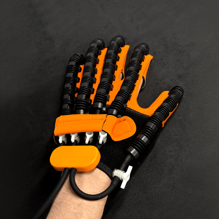 Unisex automatische revalidatie handschoen voor effectieve handtraining en beroerteherstel.