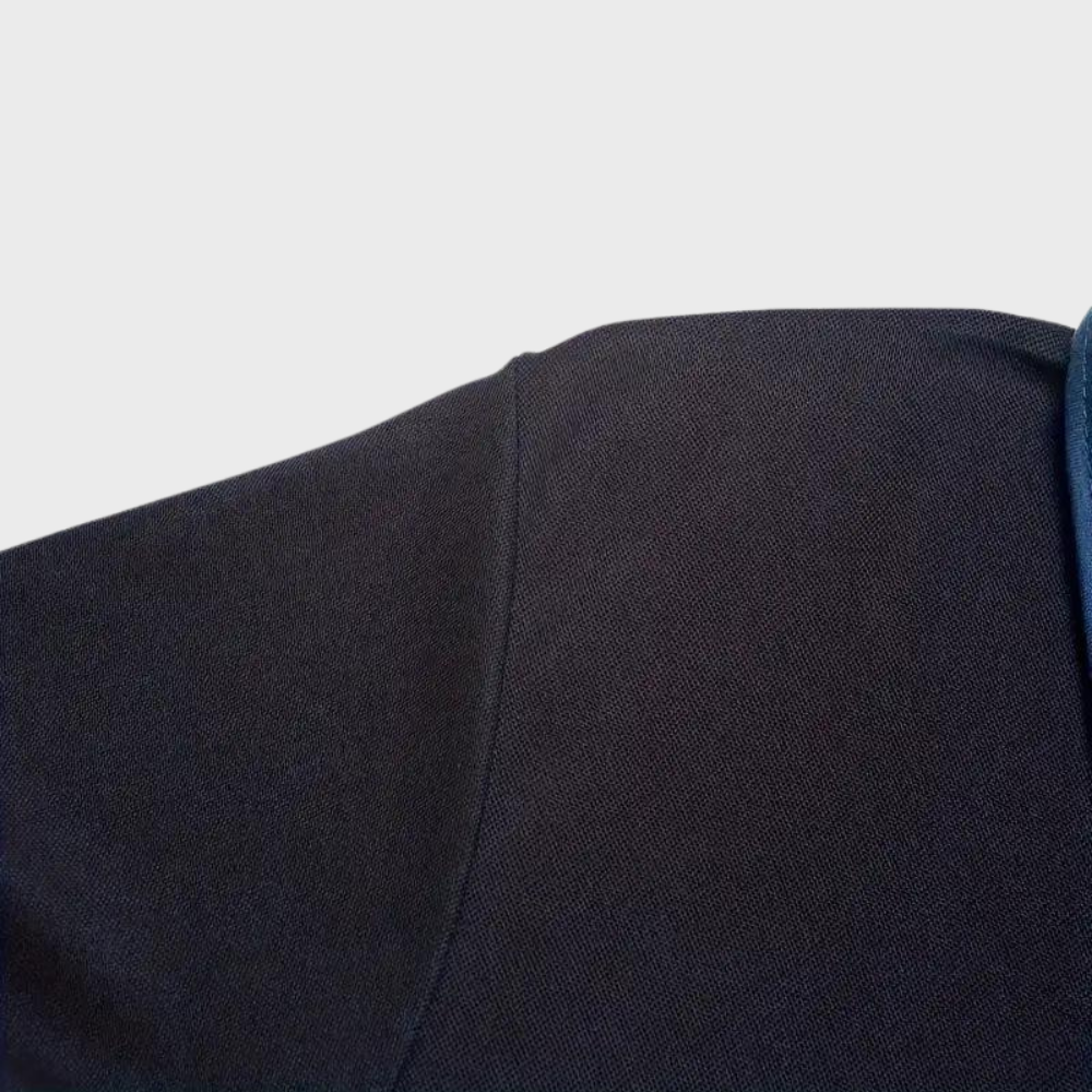 Relaxte pasvorm Hoymans heren polo, voor ultiem comfort en bewegingsvrijheid.