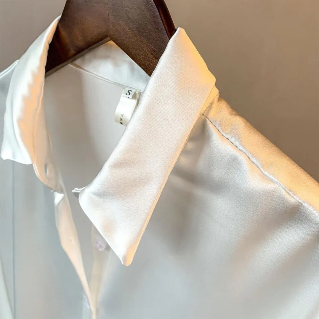 Tijdloze damesblouse, retro charmant. Stijlvolle top met lange mouwen, comfortabel en elegant voor elke damesgarderobe.