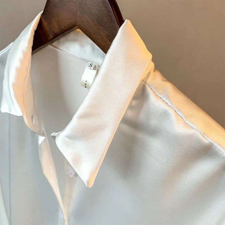 Tijdloze damesblouse, retro charmant. Stijlvolle top met lange mouwen, comfortabel en elegant voor elke damesgarderobe.