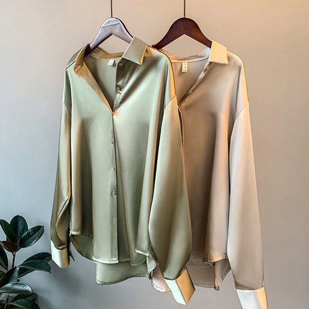 Modieuze damesblouse in retro-chique stijl. Elegante top met lange mouwen, ideaal voor een klassieke, comfortabele look.