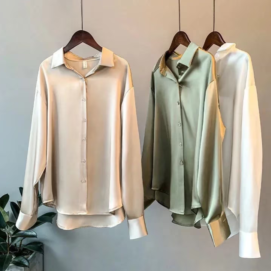 Stijlvolle damesblouse, retro design. Klassieke pasvorm met lange mouwen, comfortabel en chique voor de moderne vrouw.